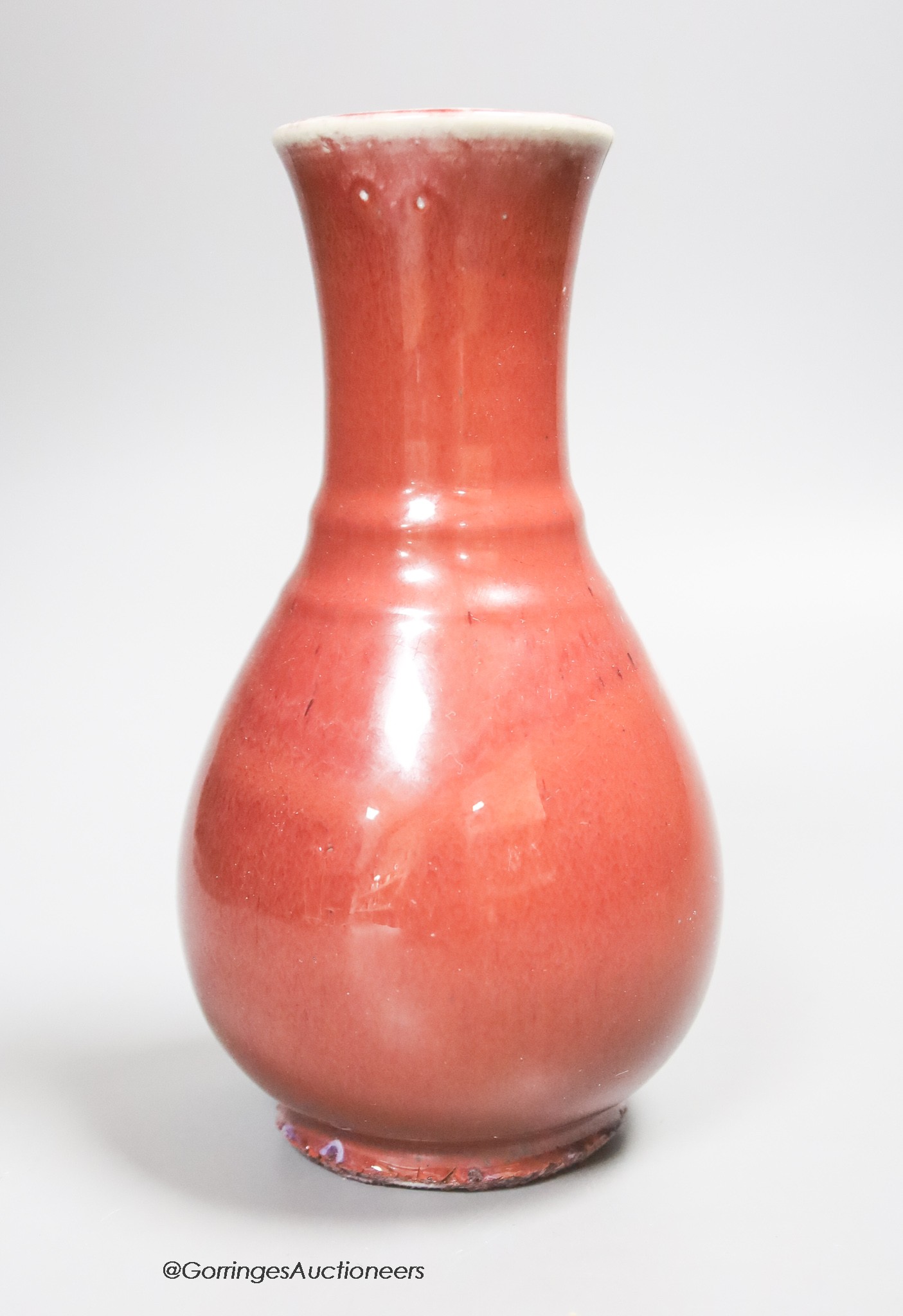 A Chinese Sang de boeuf glazed vase, height 16cm